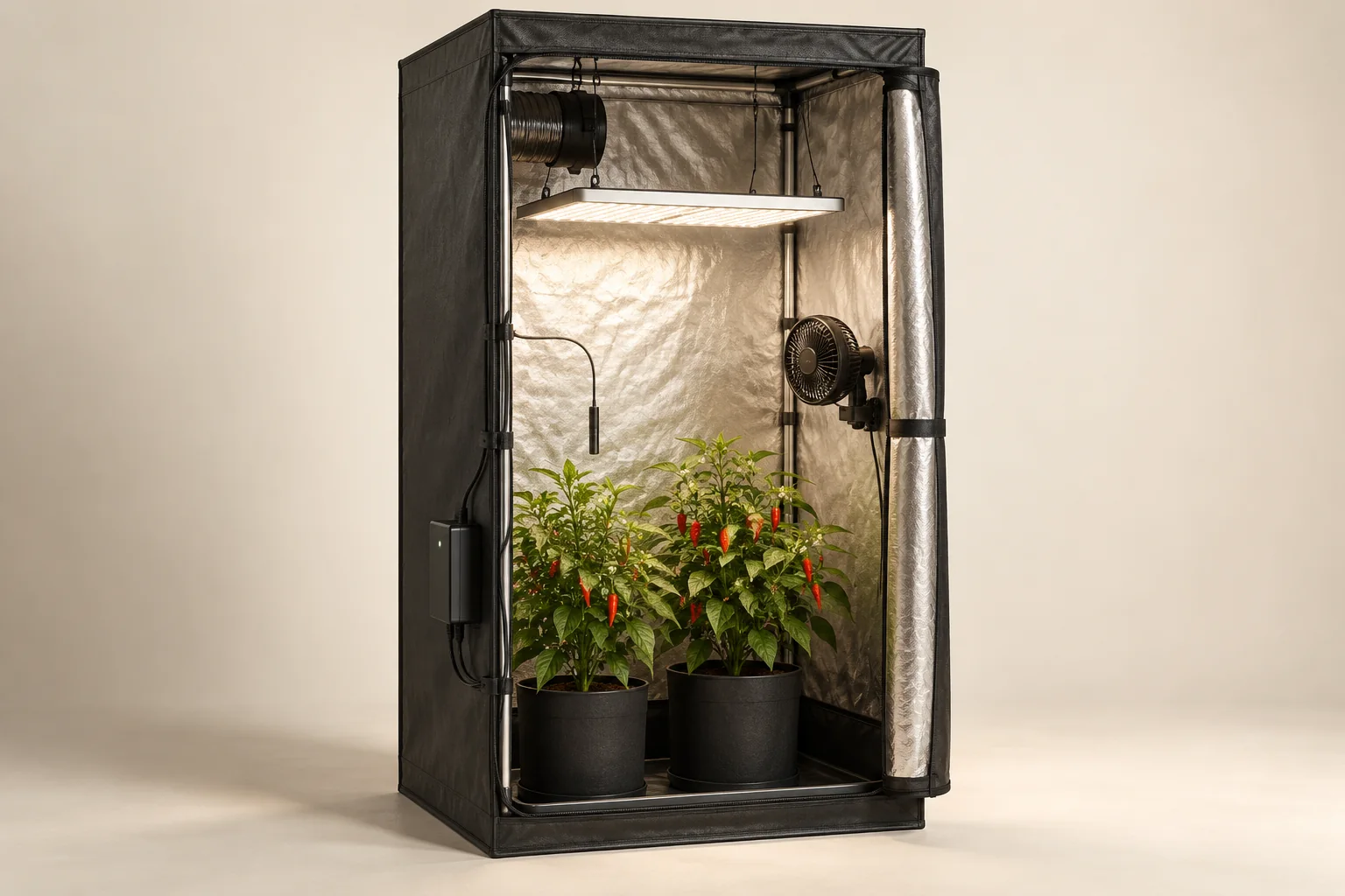 Charcoal Compact grow tent with suspended LED, ventilation and potted chili plants
